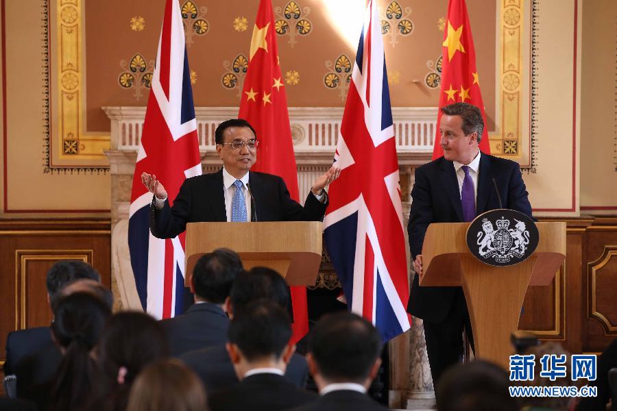 6月17日，國務院總理李克強同英國首相卡梅倫在倫敦舉行中英總理年度會晤后共同會見記者。新華社記者 龐興雷 攝
